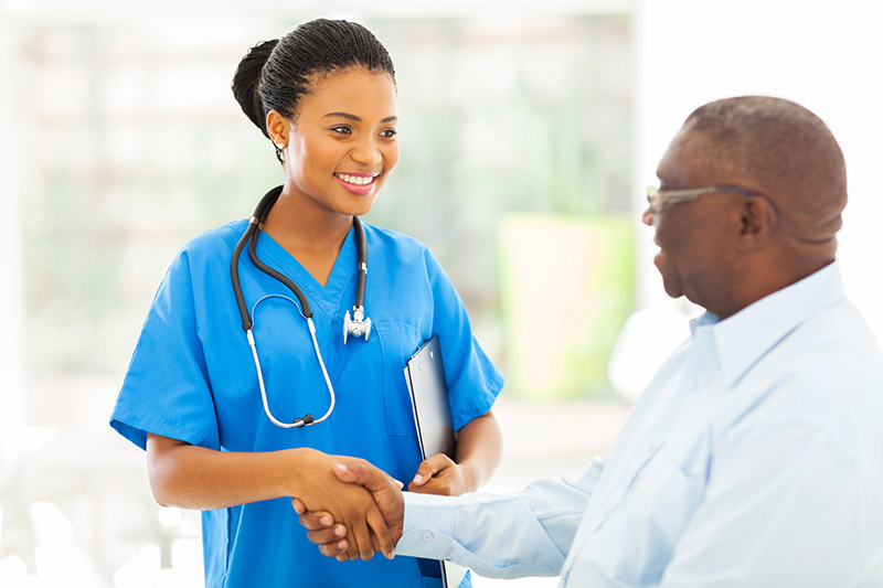 man talking to woman doctor