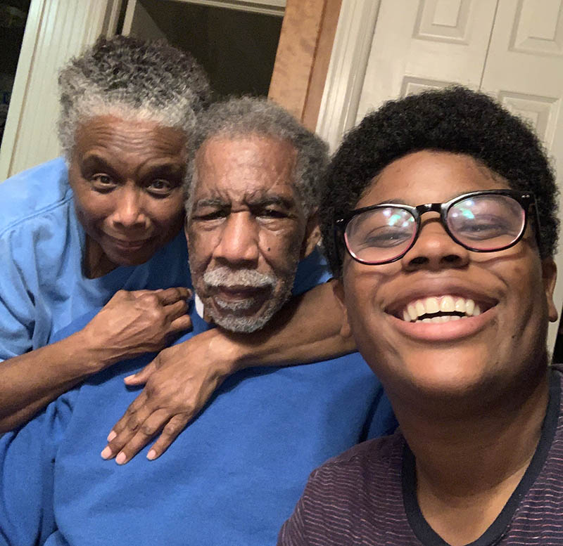 Lumiere Rostick (right) with their grandparents, Georgia and Bobby Philpot. (Photo courtesy of Lumiere Rostick)