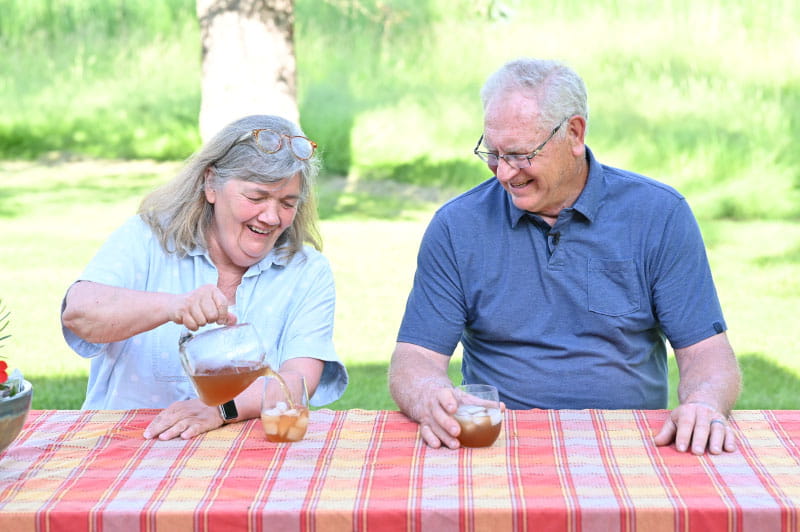 Chuck and Ann Wendel on their farm near Valley City, North Dakota. Chuck is working to get more automated external defibrillators in the community – nearly two decades after someone used an AED to save his life. (Photo by Walter Johnson Jr./American Heart Association)