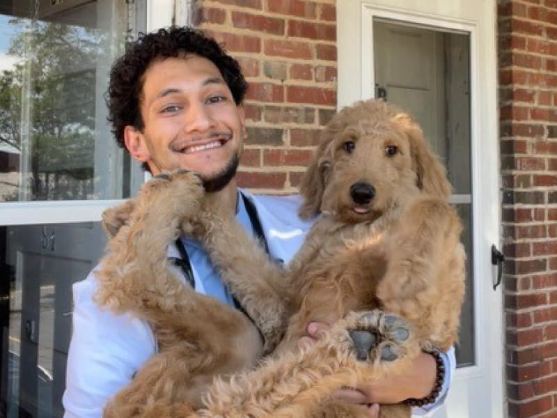 Charlie Pérez-Suárez with Bradley, one of his two dogs. (Photo courtesy of Charlie Pérez-Suárez)