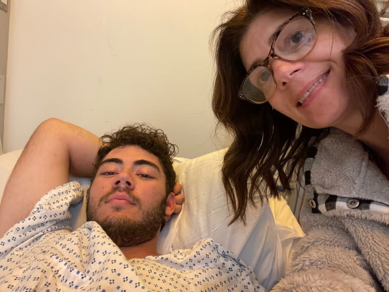 Nick DiCarlo (left) recovering in the hospital with his mom, Nicole Baker, at his side. (Photo courtesy of Nick DiCarlo)