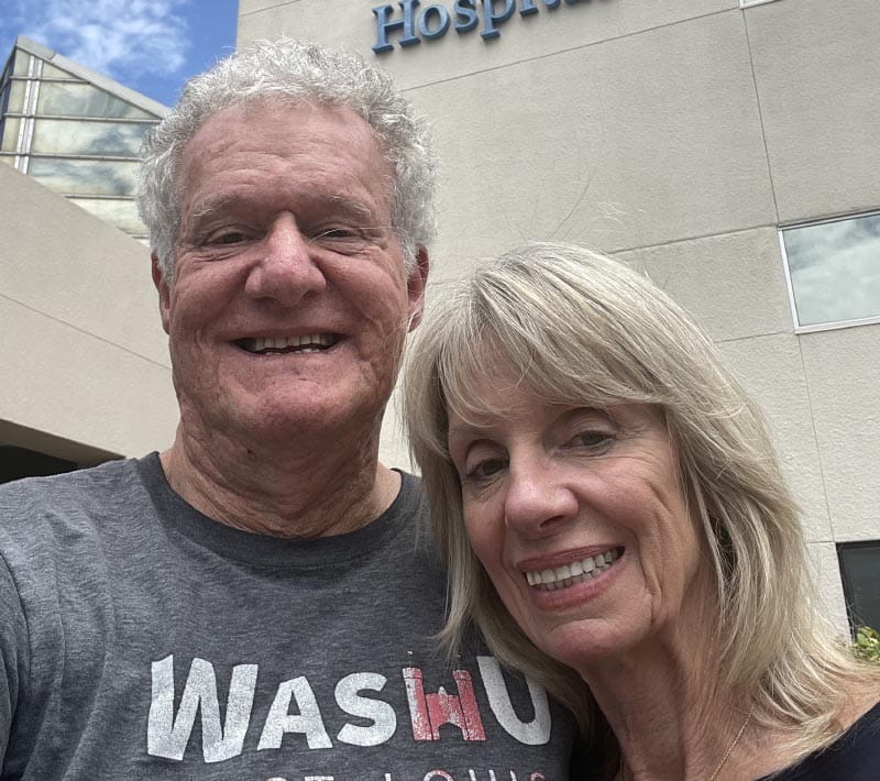 Paul Krueger (left) and his wife, Meg Bouher, outside of the hospital where Krueger was treated for his stroke. (Photo courtesy of Paul Krueger)