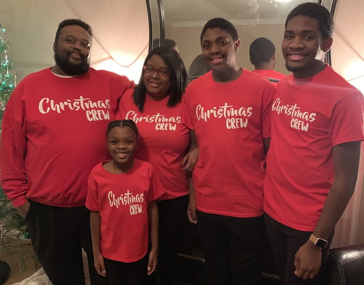 Heart transplant recipient Cherron Gilmore (second from left), surrounded by family. 