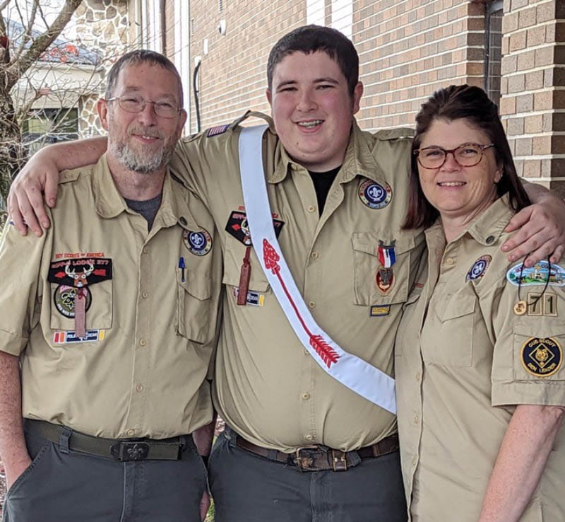 Ethan Rutherford (center) with his parents, Mark and Erin. (Photo courtesy of the Rutherford family)