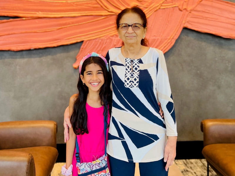 Stroke survivor Rekha Desai (right) with her granddaughter Kaiya. (Photo courtesy of Dhaval Desai)