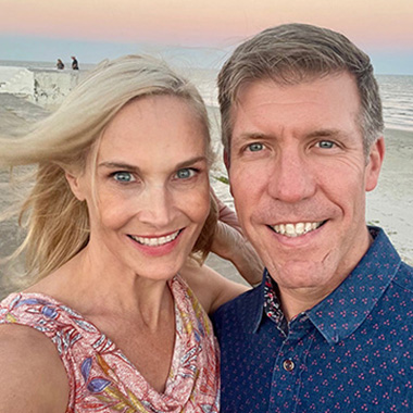 A selfie of stroke survivor, Laura Sammons, and her husband at the beach