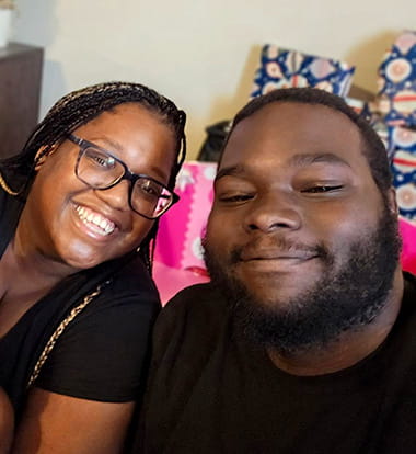 Stroke survivor, Daniel Ganier, and his wife, Denisha, smiling