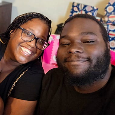 Stroke survivor, Daniel Ganier, and his wife, Denisha, smiling