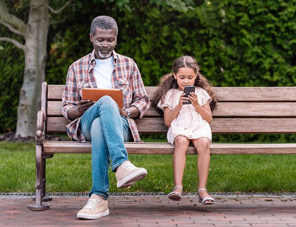 grandfather and child on bench grandfather and child on bench