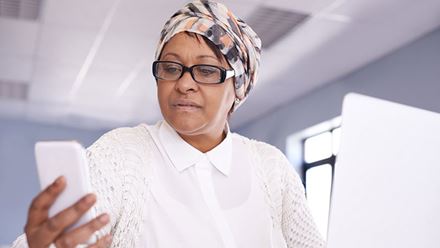 woman looking at phone woman looking at phone