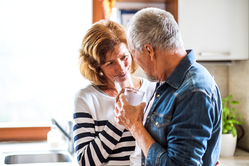 Senior Couple in the kitchen talking