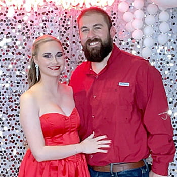 Tyler Sacco posing with his wife Tyler Sacco posing with his wife