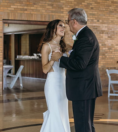 Stroke survivor, Manuel Vera, dancing with his daughter at her wedding